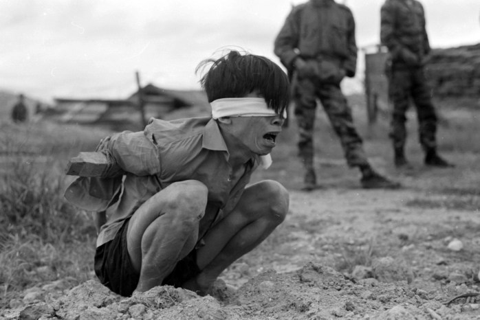 vietcong-prisoner-captured-by-the-us-army-awaits-interrogation-during-vietnam-war